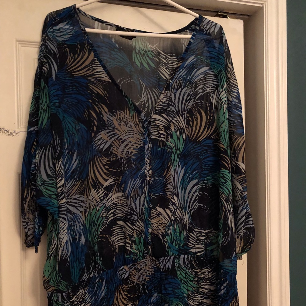 Cute top with lots of details